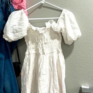 Used white doll dress for women but still in good condition